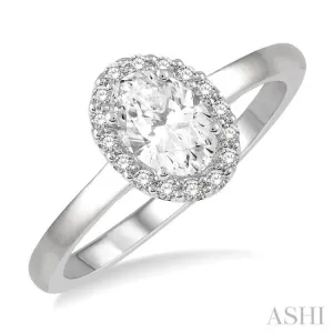 5/8 ctw Oval and Round cut Diamond Ladies Engagement Ring with 1/2 Ct Oval Cut Center Stone in 14K White Gold