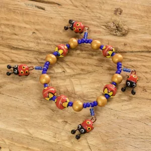 Handcrafted Ceramic Beaded Stretch Bracelet with Ladybugs - Cheerful Ladybugs | NOVICA