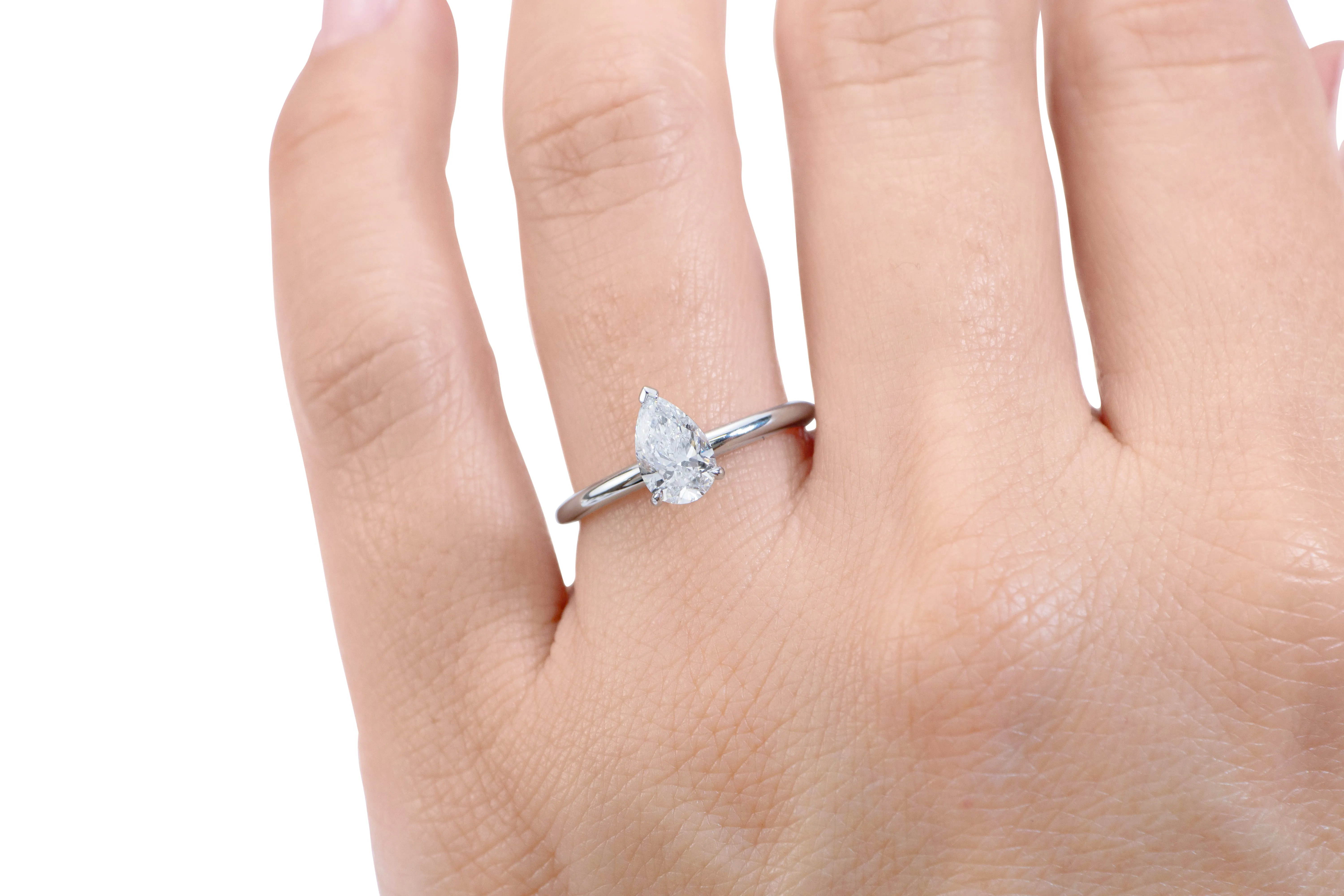 Signature Simulant Diamond 1.00 carat* pear solitaire engagement ring in 14 carat white gold