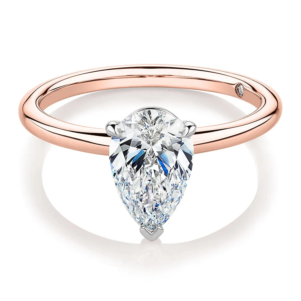 Signature Simulant Diamond 1.50 carat* pear solitaire engagement ring in 14 carat rose and white gold