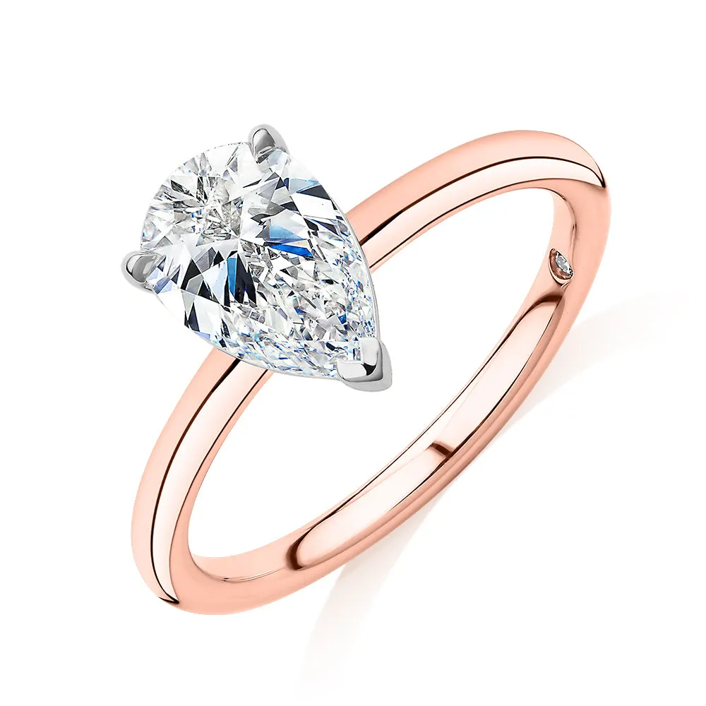 Signature Simulant Diamond 1.50 carat* pear solitaire engagement ring in 14 carat rose and white gold