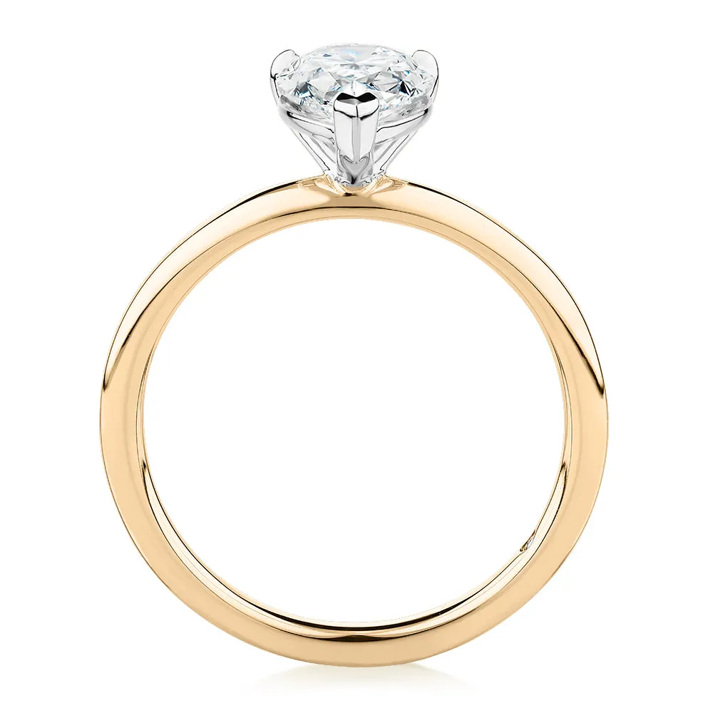 Signature Simulant Diamond 1.50 carat* pear solitaire engagement ring in 14 carat yellow and white gold